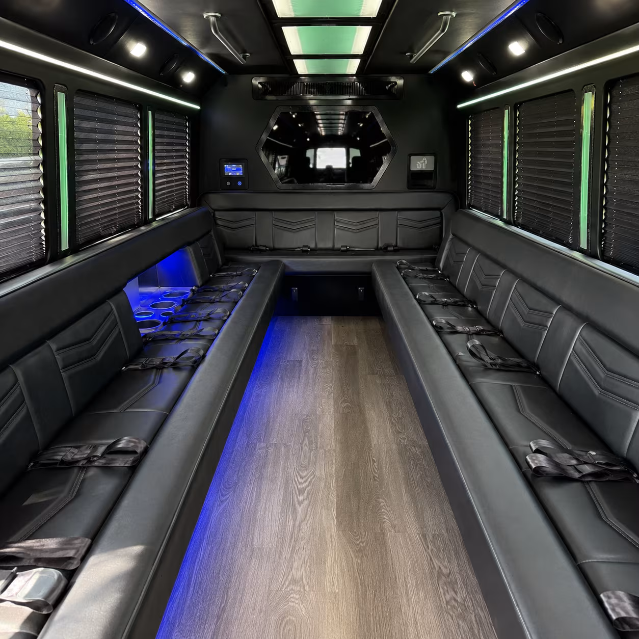 Group beside a Mercedes Sprinter limo in Wichita