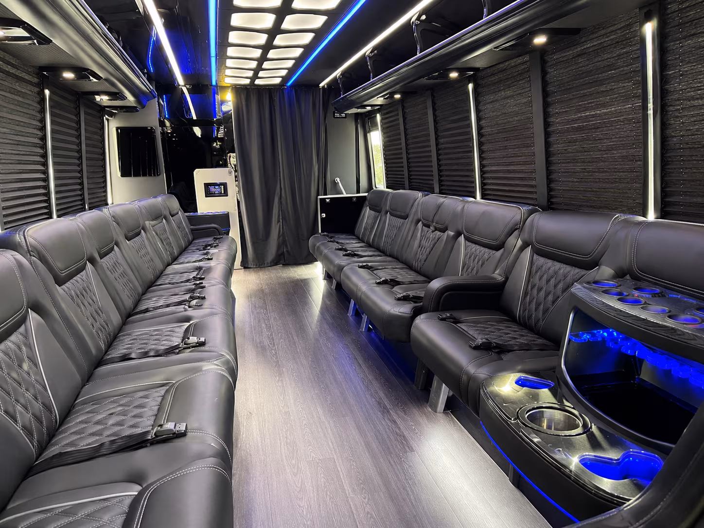 Wedding guests seated inside a party bus serving Wichita